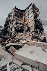 Fototapeta premium destroyed and burned houses in the city during the war in Ukraine