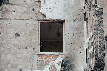 destroyed and burned houses in the city during the war in Ukraine