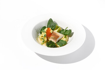 Cod Fillet with Red Caviar and Zucchini and Broccoli Garnish on White, an Elegant Dish for Fine Dining