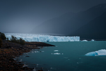 Perito Moreno Glacier with fantastic cloud and mountain as background (Patagonia, El calafate, Argentina)