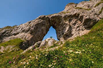 Nature rock window. Biggest rocky window, Ohniste, Low Tatras mountains, Slovak republic. Hiking theme. Seasonal natural scene.