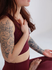 Woman doing breathing exercise during yoga practice on white background, close up. Body - Mind connection, Stress concept.