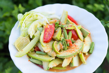 Young melon thai salad in white dish  