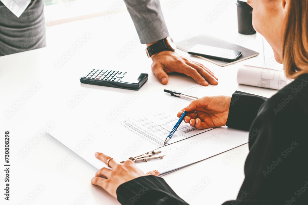 Poster architect and engineer working with construction drawing project on table in office. architecture an