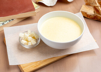 Cream cheese soup with croutons. Lunch.