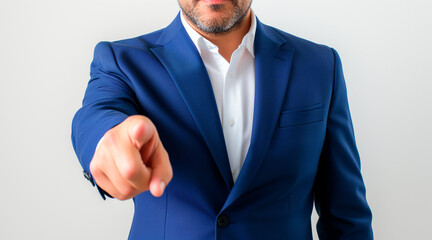 headless businessman in his forties, image cropped just below the neck, wearing a blue suit, no beard, well-groomed appearance, pointing at the camera with hand visible, white background, no blur, sha - obrazy, fototapety, plakaty