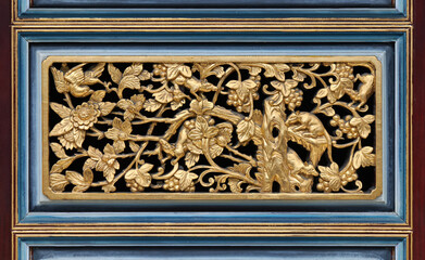 vintage door decorative in penang. Peranakan style door carving glided with gold leaf.