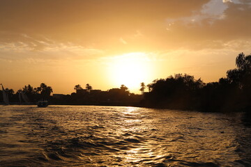 Scenic sunset over the river. Beautiful Nile River on a sunny day.