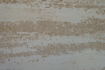 Macro of beige semi-smooth wall with stucco lace finish - obrazy, fototapety, plakaty