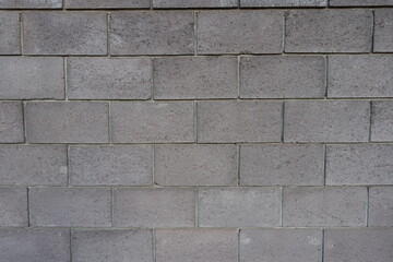 Front view of wall made of gray concrete masonry units