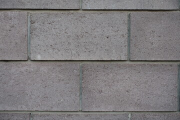 Macro of waal made of gray concrete masonry units