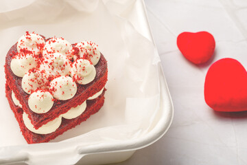 Valentine's day sweets. Red velvet cakes. Tasty cake with hearts. Festive background