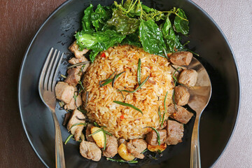 Delectable Garlic Fried Rice with Rosemary Grilled Beef and Deep Fried Crispy Holy Basil