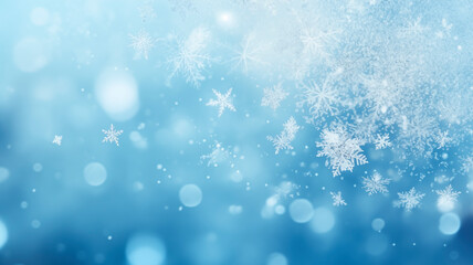Fototapeta premium Winter background, falling beautiful snowflakes, selective focus. Falling snow and snowflakes close-up on a blue background