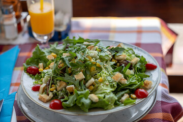 Steak salad, various types of lettuce with grilled beef steak and corn, popular mediterranean meal