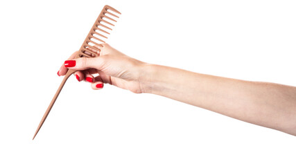 Hair comb in hand isolated on white background. Hairbrush isolated.