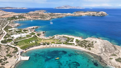 Foto auf Glas Aerial drone photo of paradise secluded beach and bay of Agios Vasileios located in long peninsula of small island of Schoinousa, Small Cyclades, Greece © aerial-drone