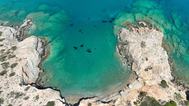 Aerial drone photo of paradise secluded beach of Agios Petros located in long peninsula of small island of Schoinousa, Small Cyclades, Greece © aerial-drone