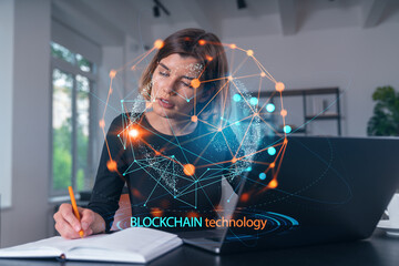 Pensive attractive beautiful businesswoman in formal wear working on laptop at office workplace in background. Notebook, table. Concept of business education, blockchain cryptocurrency technology.