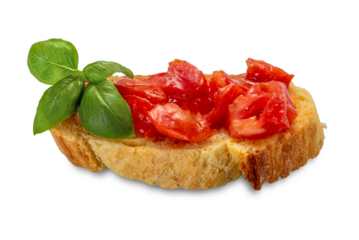 Bruschetta with tomato and basil leaves, slice of bread with fresh tomato pieces and olive oil isolated