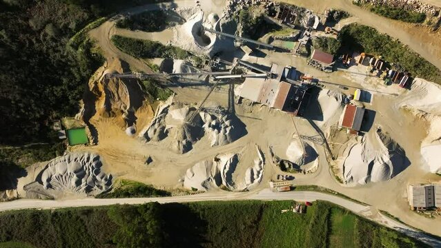 Bird's eye drone shot of a quarry mining site in Castriz village in Santa Comba in A Coruna, Spain