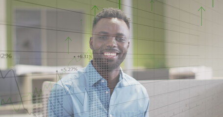 Image of financial data processing over biracial businessman