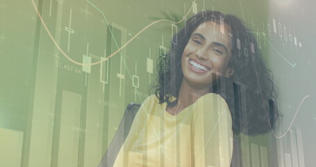Image of financial data processing over smiling biracial businesswoman