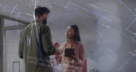 Image of financial data processing over diverse business people using tablet in office