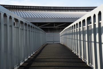 Yorkshire, UK – 21 Dec 2020: A Symmetry on a Pedestrian footbridge on a bright December day, Sheffield UK
