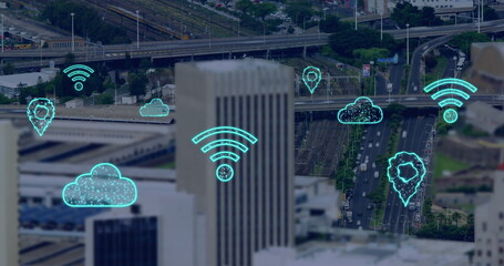 Image of digital clouds and icons flying over cityscape