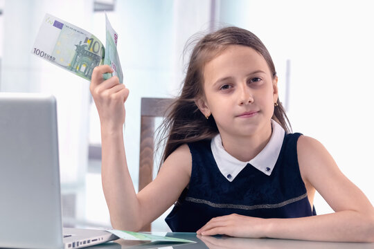 Conceptual image: Best investments for beginners. Portrait of young beautiful girl working online and counting Euro money.