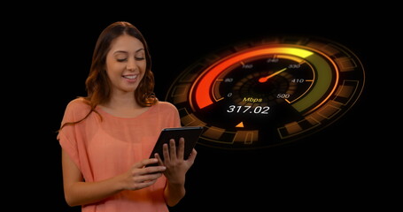 Image of orange speedometer over happy caucasian woman using tablet