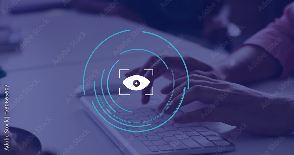 Poster Image of eye icon over hands using computer in office