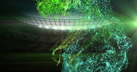 Image of green particles moving over sports stadium