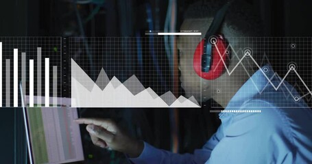Animation of financial data processing over african american businessman in server room - Powered by Adobe