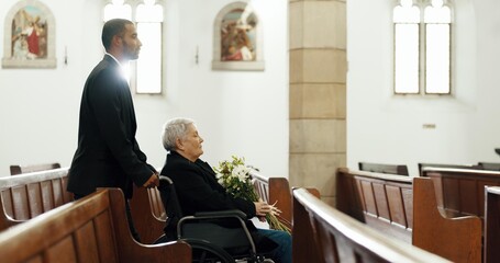 Sad, funeral and church with old woman and wheelchair user for death, mourning and widow. Depression, grief and help with person with a disability at chapel for bereavement, burial ceremony and loss