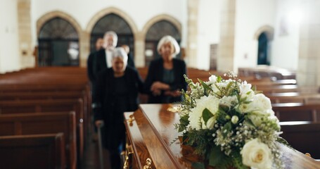 Funeral, church and people with coffin for goodbye, mourning and grief in memorial service. Depression, family and sad senior women with casket in chapel for greeting, loss and burial for death - obrazy, fototapety, plakaty