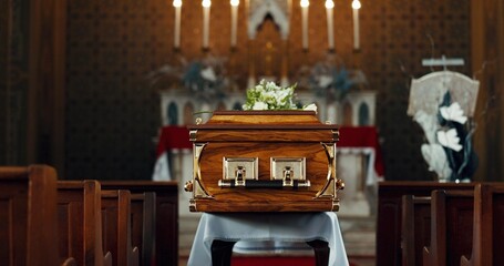 Coffin, church and funeral service in closeup, memorial and event to celebrate life, worship and...