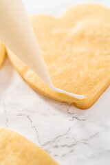 Heart-shaped sugar cookies with royal icing