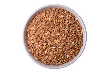 Large grains of wheat porridge are brown in color when raw
