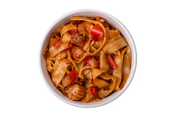 Delicious asian udon dish with vegetables, mushrooms, salt and spices