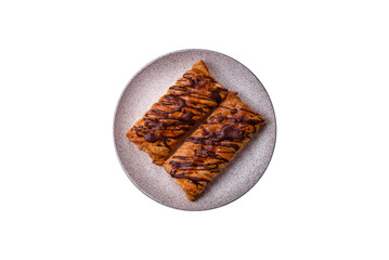 Delicious crispy sweet puff pastry with chocolate and salted caramel