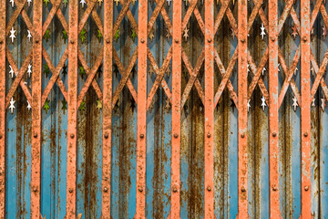 The rusty steel door background.