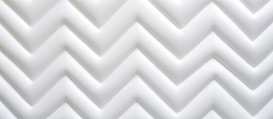 White zigzag pattern on quilted surface, creating an abstract background with a soft texture.