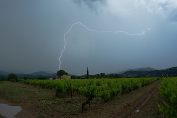 Thunderstorm with lighting over the vineyard of Pierrefeu du var, France