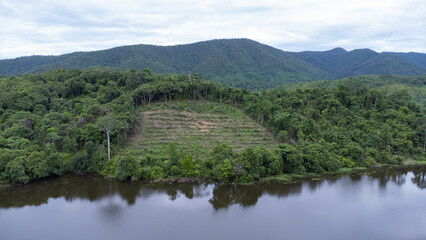 Naklejka na ściany i meble Aerial view of the lake in the mountainous area of South Kalimantan located in Sungai Dua village