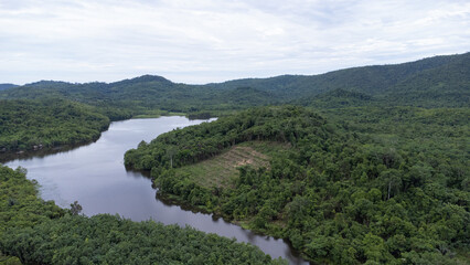 Obraz premium Aerial view of the lake in the mountainous area of South Kalimantan located in Sungai Dua village