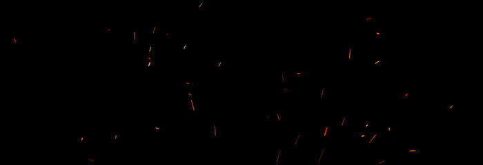 Sparks and fire on a black background