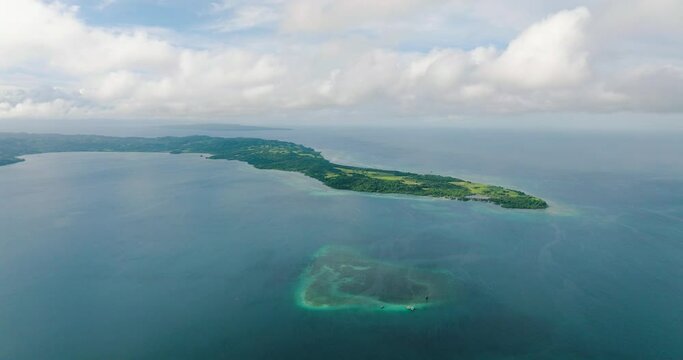 Protected marine area in the middle of the bay at Looc town, Tablas Island. Looc Fish Sanctuary. Romblon, Philippines.