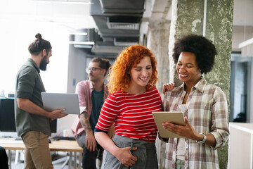 Happy coworker startup people working and having meeting with friendly diverse colleagues in office.